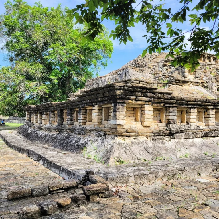 Side view of stepped temple with stone niches at El Tajín archaeological site, Veracruz