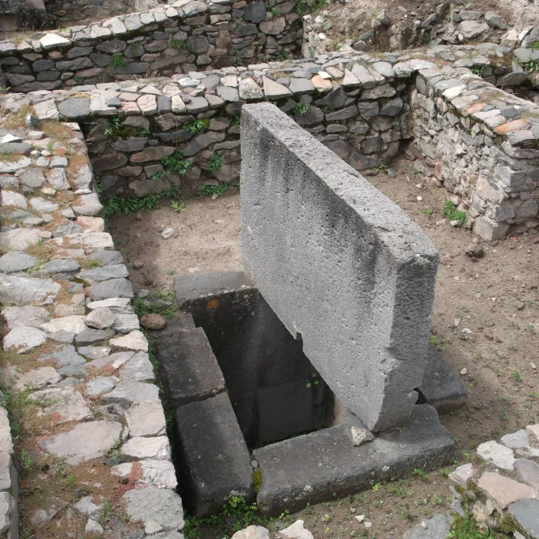 Stone burial chamber at Huari ruins in Ayacucho Peru showing Wari Empire funerary architecture