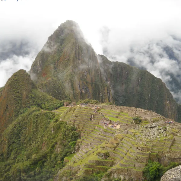 Panoramic view of Machu Picchu’s agricultural terraces and main complex with Huayna Picchu towering in the background
