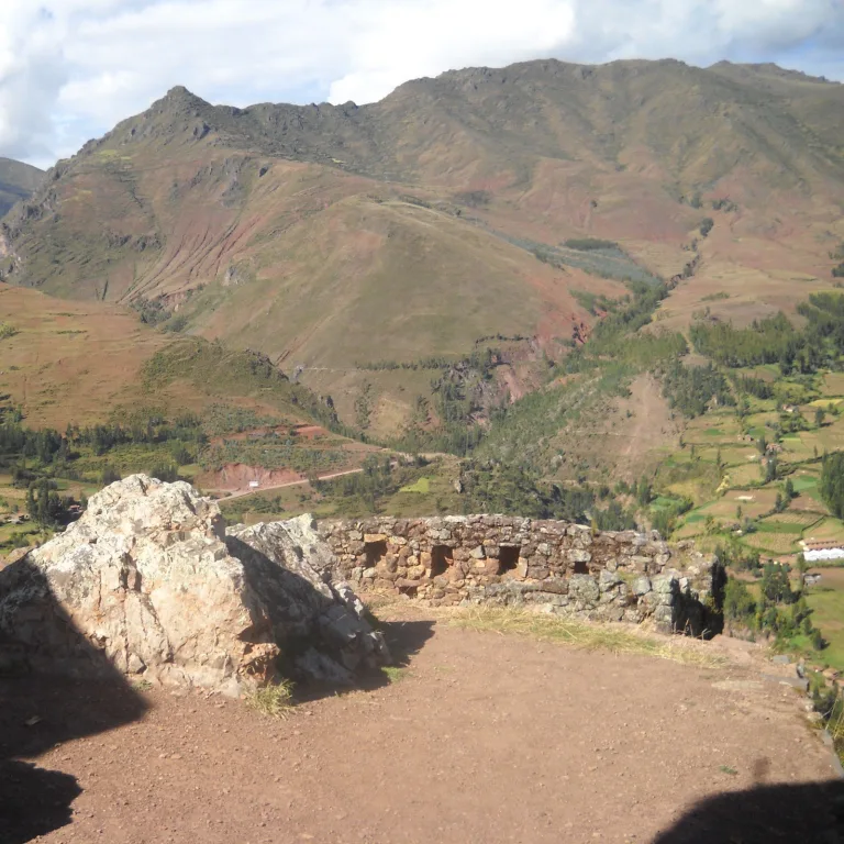 Stone guard post with narrow openings at Pisac ruins, overlooking Peru’s Sacred Valley