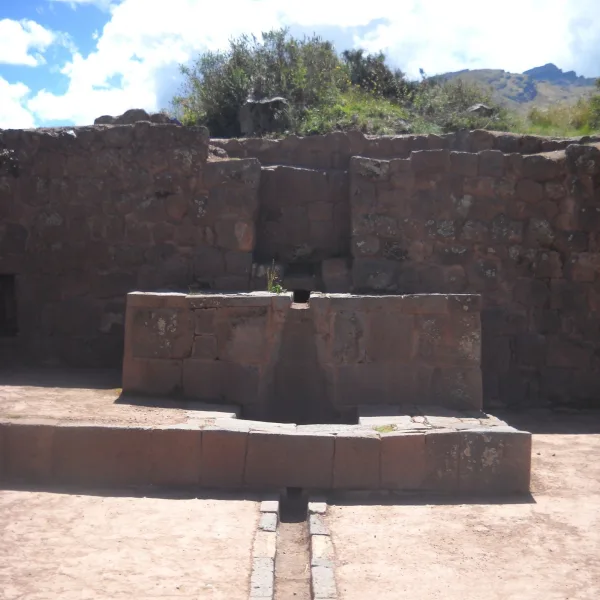 Stone altar fountain at Tipón with carved water channel used for ritual purification