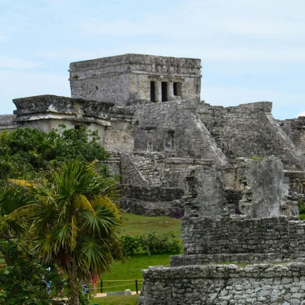 Front view of El Castillo rising over the central plaza at the Tulum archaeological site