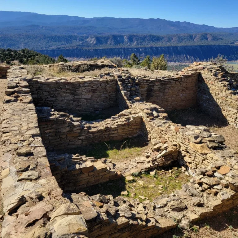 Detailed shot of the fragmented, rectangular stone masonry walls of the Great House Complex ruins at Chimney Rock.