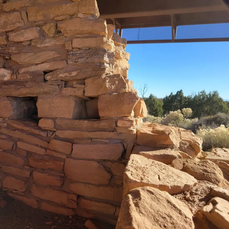 Close up of excavated contiguous rectangular room foundations and low divider walls of the main pueblo complex.