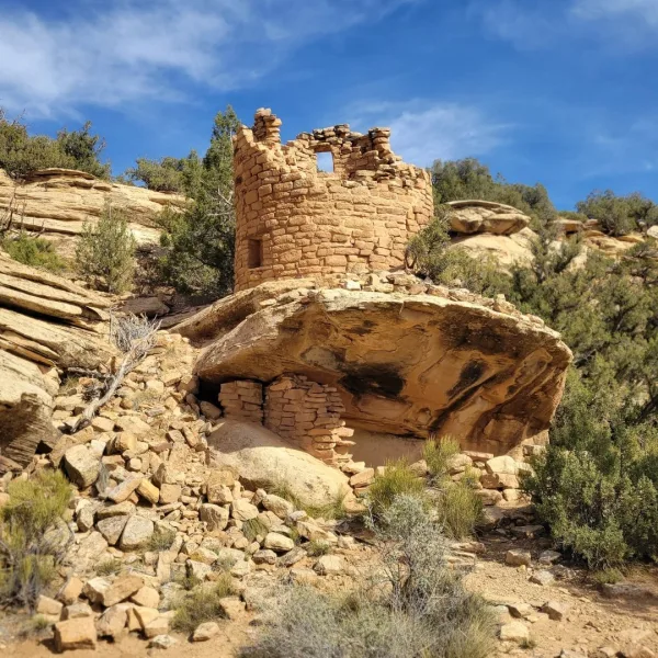 Round tower of Painted Hand Pueblo built on a sandstone boulder in Canyons of the Ancients