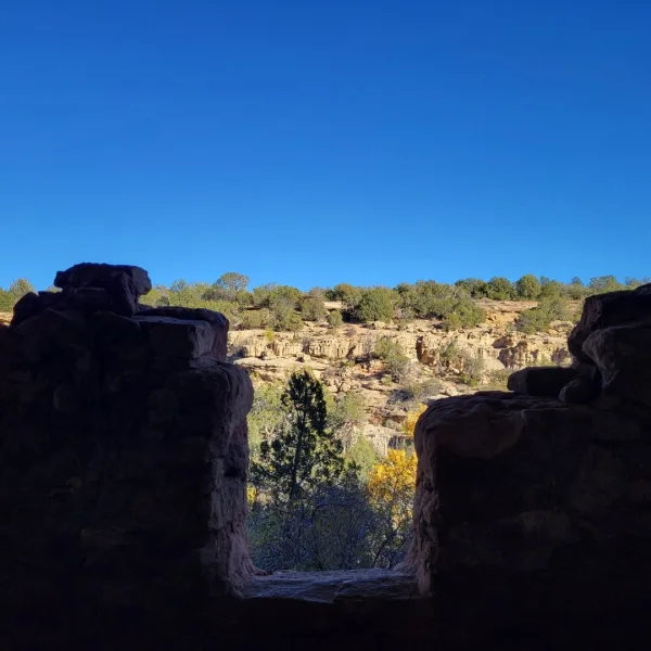 Trail sign marking the route to Five Kiva Pueblo in Utah.