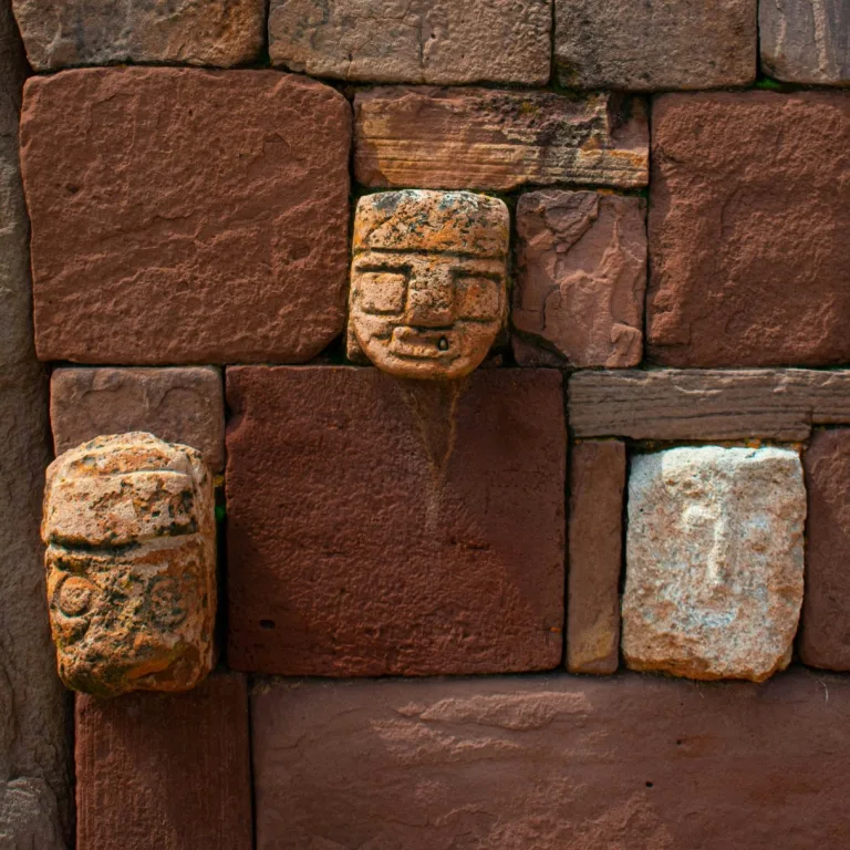 Tenon heads set into the stone wall of the Semi-subterranean Temple at Tiwanaku in Bolivia.