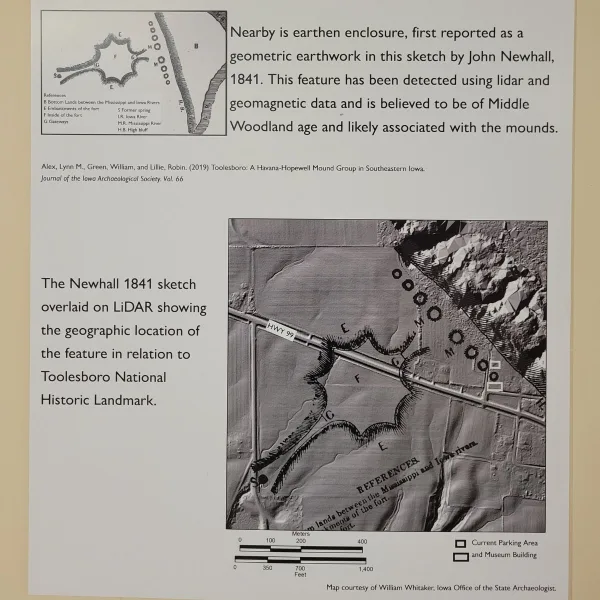 Information panel at Toolesboro Mounds explaining the nearby earthen enclosure first recorded in John Newhall’s 1841 sketch and later detected with LiDAR and geomagnetic data.
