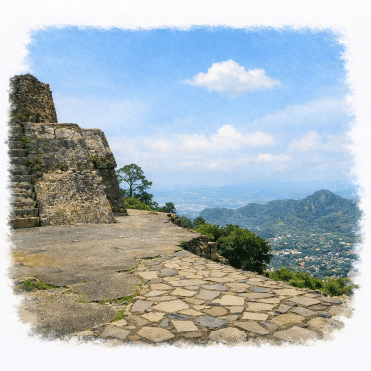 Stone remains of the Temple of Tepoztécatl at El Tepozteco, overlooking the town of Tepoztlán and the surrounding mountains of Morelos, Mexico.