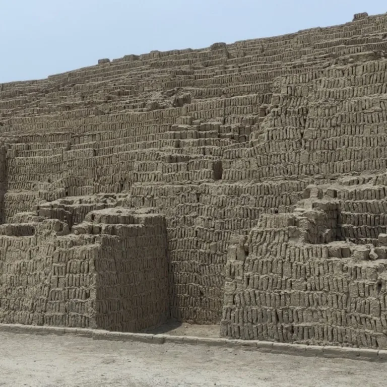 The Gran Pirámide at Huaca Pucllana in Lima, Peru, showing closely spaced adobe brick walls, staggered terraces, and the distinctive vertical brick arrangement of Lima culture architecture.