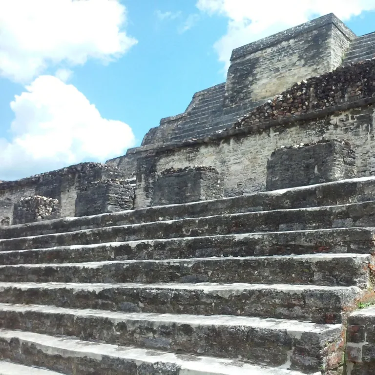 Stone staircase ascending the monumental terraces of El Castillo at Xunantunich in Cayo District, Belize.
