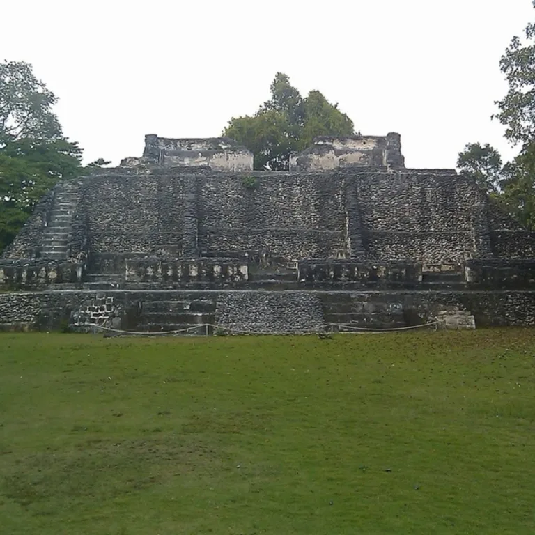 Structure A-11 at Xunantunich in Cayo District, Belize, showing the elevated Maya palace platform and summit rooms overlooking Plaza A-III.